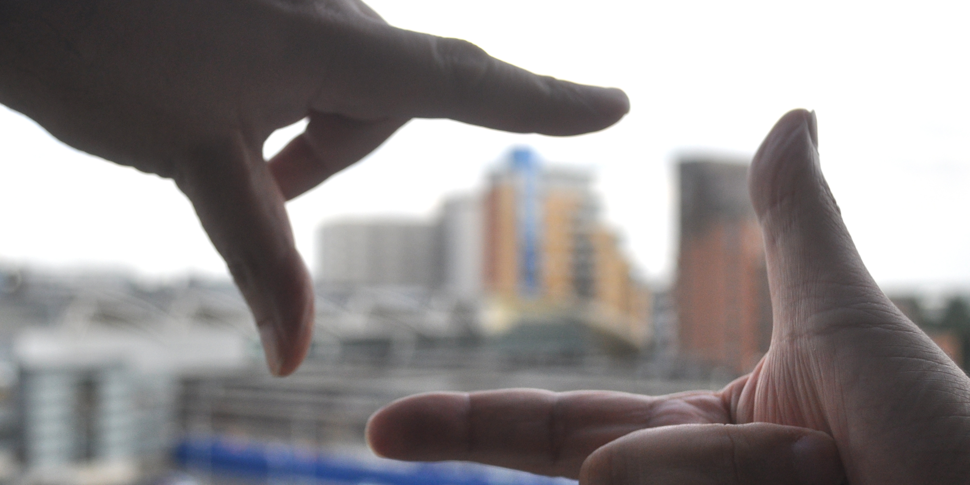 Photo: fingers arranged in a framing suggestion.